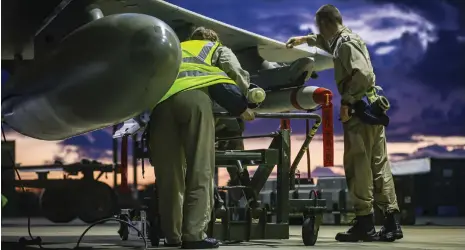  ?? AP ?? British air force technician­s prepare a Typhoon aircraft in Cyprus for strikes against Houthi military targets in Yemen