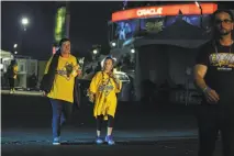  ?? Josie Norris / The Chronicle ?? Fans leave Oracle Arena after Game 6 of the NBA Finals — the team’s last game in Oakland before moving across bay.