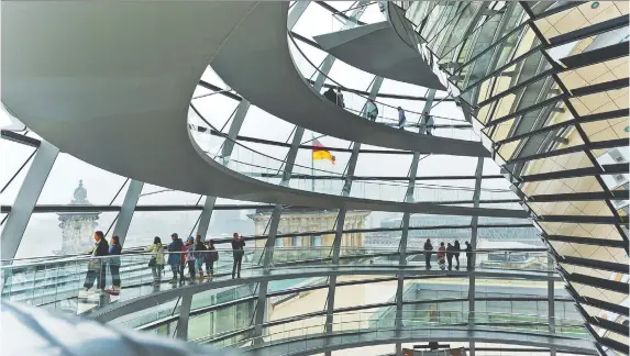  ?? PHOTOS: DOMINIC ARIZONA BONUCCELLI ?? At the Reichstag in Berlin, visitors are treated to breathtaki­ng vistas and views of the interior as they spiral up the 24-metre-high glass dome.