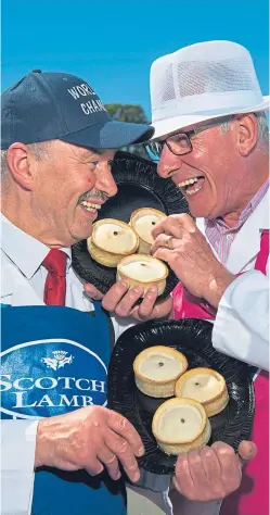  ??  ?? Angus butcher Alan Pirie, left, and Ayrshire baker Stephen Mcallister with their quality Scotch pies in the contest.