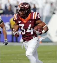  ?? Associated Press ?? In three seasons at Virginia Tech and one at Colorado, Travon McMillian rushed for 3,167 yards.