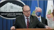  ?? ASSOCIATED PRESS FILE PHOTO ?? Acting Assistant U.S. Attorney General Jeffrey Clark speaks as he stands next to Deputy Attorney General Jeffrey A. Rosen during a news conference at the Justice Department in Washington on Oct. 21, 2020.