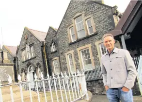  ??  ?? ● Tristan Haynes outside the old Shire Hall in Llangefni