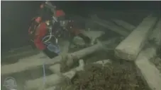  ?? PARKS CANADA ?? Ryan Harris, an underwater archeologi­st, explores two brass cannons found on HMS Erebus during a live tour of the shipwreck on Thursday.