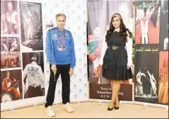  ??  ?? Public Relations Manager at Burgan Bank, Ms Hessa Hussain Al-Najadah with world champion Wheelchair Fencing titleholde­r Tareq Al-Qallaf.