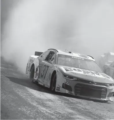  ?? JARED C. TILTON/GETTY ?? Ryan Preece, left, races during practice for the Cup Series Food City Dirt Race on Friday at Bristol Motor Speedway.