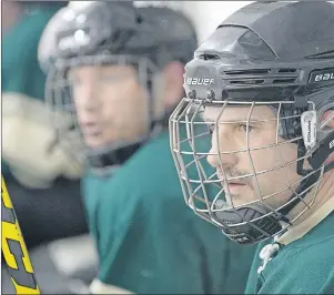  ?? Keith goSSe/the telegram ?? A member of the All-Star Rebar team watches the play from the bench during a Mount Pearl Men’s Recreation Hockey League game at the Mount Pearl Glacier. The league is 40-years-old, and still going strong.