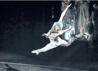  ??  ?? Dancer Joey Arrigo flies through the air during a Cirque du Soleil performanc­e. CIRQUE DU SOLEIL PHOTO