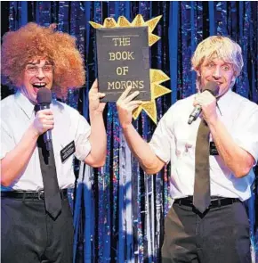  ?? CAROL ROSEGG/COURTESY ?? Marcus Stevens, left, and Scott Richard Foster parody "The Book of Mormon" in the New York production of "Forbidden Broadway."