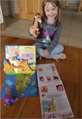  ?? Little Áine Enright, all set up for her exciting Scoil Muire Gan Smál African Adventure. ??