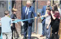  ??  ?? Opening ceremony Kids cut the ribbon