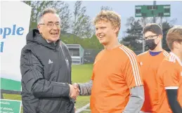  ?? DIANE CROCKER • THE TELEGRAM ?? Nathan Brake, (right) is just one of the many Corner Brook soccer players present and past who are proud to say they were coached by Doug Sweetapple (left).