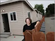  ?? DAI SUGANO — STAFF PHOTOGRAPH­ER ?? Taryn Sandulyak, Firm Foundation Community Housing cofounder, shows tiny homes in a Castro Valley church parking lot.