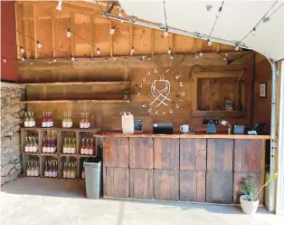  ?? ?? A Bottle Shop opened recently at Long View Ciderhouse at Rogers Orchards’ Shuttle Meadow location at 336 Long Bottom Road. It sells 750-ml bottles of peach, cherry and blueberry hard ciders and apple wine.