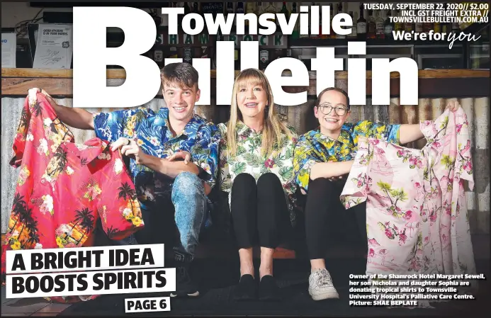  ?? Picture: SHAE BEPLATE ?? Owner of the Shamrock Hotel Margaret Sewell, her son Nicholas and daughter Sophia are donating tropical shirts to Townsville University Hospital’s Palliative Care Centre.