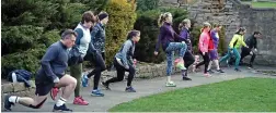  ??  ?? Here we go...boot camp exercise class in Springhead Park, Leeds