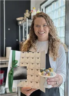  ?? ?? Wright, of A519 Chocolate in Millvale, has created an edible Advent calendar featuring 24 of her handmade chocolates, 16 of which are uniquely flavored bonbons.