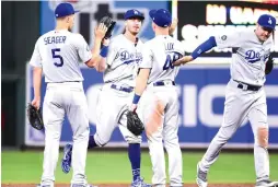  ?? (Reuters) ?? THE LA DODGERS are the third team to win seven or more consecutiv­e division titles, joining the New York Yankees (nine, 1998-2006) and Atlanta Braves (14, 1991-2005).