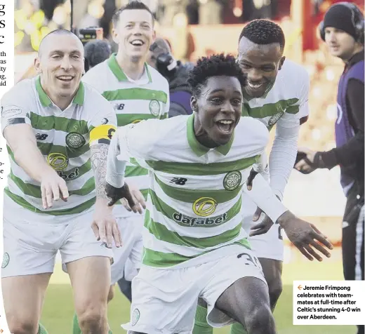  ??  ?? 2 Jeremie Frimpong celebrates with teammates at full-time after Celtic’s stunning 4-0 win over Aberdeen.