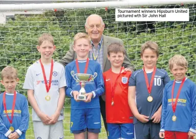  ??  ?? Tournament winners Hipsburn United pictured wth Sir John Hall