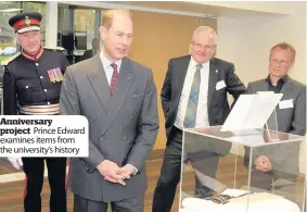  ??  ?? Anniversar­y project Prince Edward examines items from the university’s history