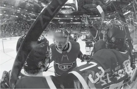  ?? USA TODAY SPORTS ?? The Montreal Canadiens celebrate advancing to the third round of the 2021 Stanley Cup Playoffs after eliminatin­g the Winnipeg Jets at the Bell Centre on Monday. The Habs hope the wait for their next opponent doesn’t slow the roll the team has been on.