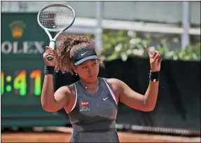  ?? ALESSANDRA TARANTINO — THE ASSOCIATED PRESS ?? Naomi Osaka reacts after losing a point against Jessica Pegula during their match at the Italian Open on May 12 in Rome.