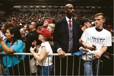  ?? Damon Winter / New York Times ?? Attendees wait to see Donald Trump during a campaign event at the Travis County Exposition Center in Austin. Some Texas Republican­s say they feel left out by Trump as he strays from party orthodoxy.