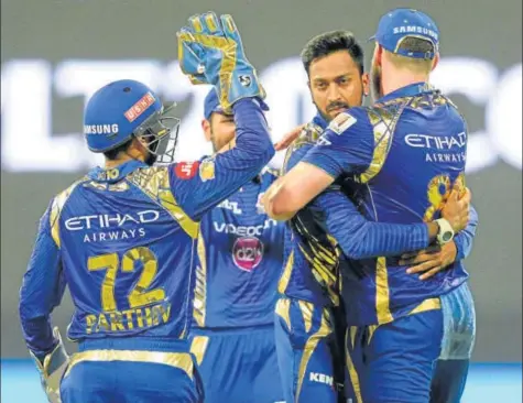  ??  ?? Krunal Pandya (centre) has set the platform for pace bowlers Jasprit Bumrah and Mitchell Mcclenagha­n to operate with very little pressure on them.