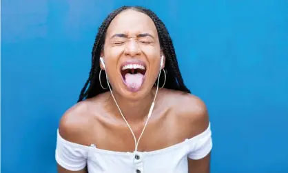  ?? Westend61/Getty Images ?? All the smartest tech and security people are saying it: wired headphones are simply better than wireless headphones. Photograph: