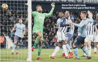  ??  ?? Ciaran Clark (right) heads Newcastle’s first goal at West Brom.