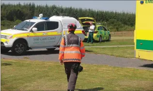  ??  ?? Emergency services at Riverchape­l Community Field where the man was airlifted to hospital in Dublin.