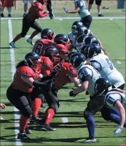  ?? SUBMITTED PHOTO ?? Members of the Calgary Rage (left) and Lethbridge Steel play in a WWCFL game in this undated photo. The Rage and Steel will play a regular season game Saturday, 1:30 p.m. at the Methanex Bowl in Medicine Hat.