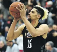  ?? STACY REVERE / GETTY IMAGES ?? Brian Bowen participat­es in drills during NBA Draft Combine last week in Chicago.