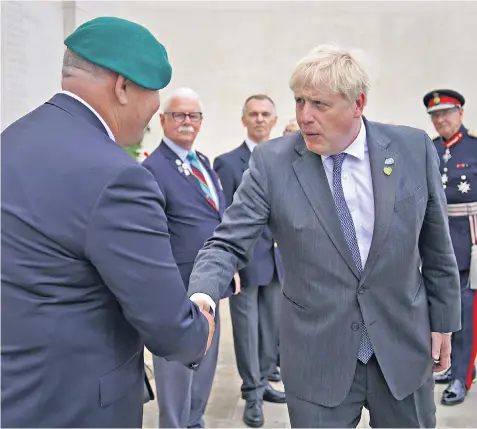  ?? ?? Boris Johnson meets veterans at the National Memorial Arboretum in Alrewas, Staffordsh­ire, before a service to mark the 40th anniversar­y of the liberation of the Falkland Islands