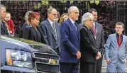  ?? JOHN SPINK / JSPINK@AJC.COM ?? The Miller family watches as Georgia ex-Gov. Zell Miller’s remains are brought to Georgia’s Capitol Tuesday to lie in state until today’s executive state funeral.