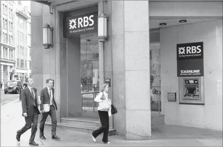  ?? SANG TAN/ASSOCIATED PRESS FILES ?? The Royal Bank of Scotland is the third internatio­nal bank to settle with investigat­ors in a case involving the manipulati­on of a key global interest rate. RBS has agreed to pay $ 612 million to U. S. and British authoritie­s for its role in the...
