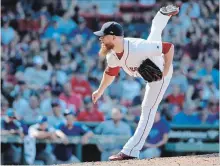 ?? STEVEN SENNE THE ASSOCIATED PRESS ?? Boston Red Sox closer Craig Kimbrel follows through on a pitch against the Toronto Blue Jays in the ninth inning Sunday.
