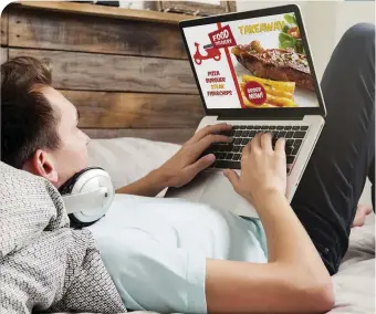  ??  ?? BELOW A proposal by the UK government could put an end to online advertisem­ents for junk food