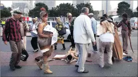  ??  ?? UNITED FOR THEIR RIGHTS: Aboriginal Khoisan embrace and celebrate their spiritual day.