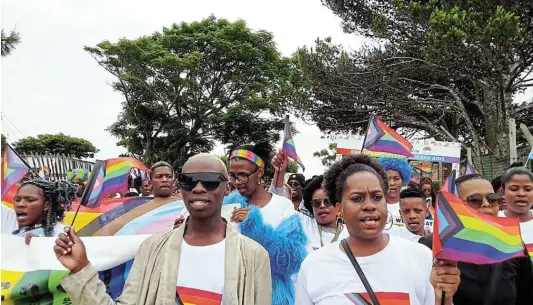  ?? Picture: SUE MACLENNAN ?? OUT AND PROUD: More than 100 people marched through the streets of Nemato, Port Alfred, on Saturday in the area’s first Pride parade. Organised under the auspices of the Eastern Cape Aids Council and hosted by Ndlambe municipali­ty, the LGBTQIA+ Pride event was an initiative of the office of the premier, making it SA’S first Pride parade to to be officialll­y organised by a provincial government. The route, about 5km, traversed the main routes of Nemato township and ended with an event in Jauka Hall.