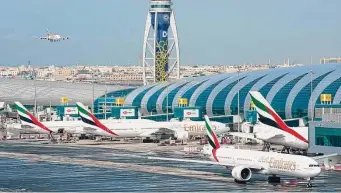  ?? Associated Press file photo ?? The airline Emirates staged a test flight with sustainabl­e fuel powering one of a Boeing 777’s two engines. Emirates described the sustainabl­e fuel as one “that mirrored the qualities of jet fuel.”