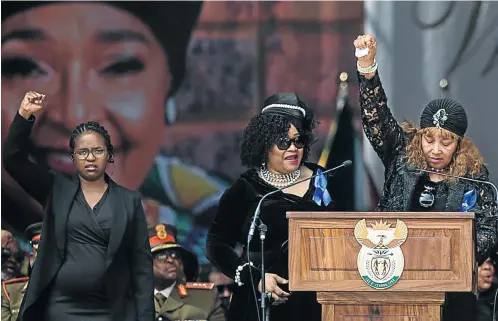  ?? Picture: AFP ?? Winnie Madikizela-Mandela’s daughters Zenani Mandela-Dlamini, right, Zindzi Mandela, middle, speak at the funeral of their mother at the Orlando Stadium yesterday.