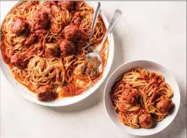  ?? Associated Press photo ?? This undated photo provided by America's Test Kitchen shows meatballs and marinara in Brookline, Mass.