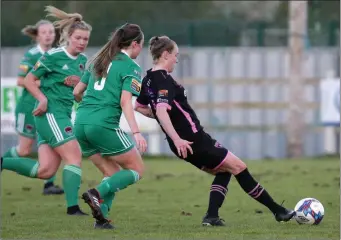  ??  ?? Danielle Burke of Cork City closes in on Claire O’Riordan of Wexford Youths.