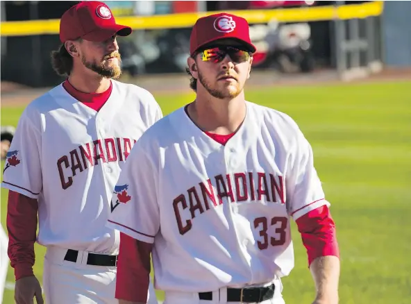  ?? FRANCIS GEORGIAN/PNG FILES ?? Brayden Bouchey, right, strolls across the outfield at Nat Bailey Stadium, where he used to watch games as a kid.