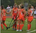  ?? OWEN MCCUE - MEDIANEWS GROUP ?? The Perkiomen Valley field hockey team celebrates a first-half goal by Danielle Hamm (30) on Monday against Spring-Ford.