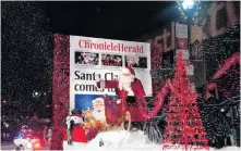  ??  ?? Santa waves to the crowd during the Chronicle Herald Holiday Parade of Light in Halifax, Nov. 16, 2013.