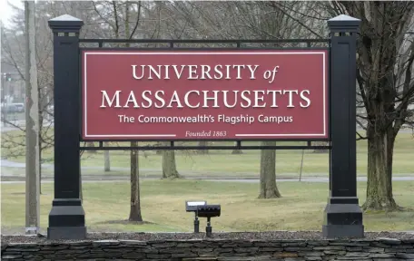  ?? ChristOphe­r evans / heralD staff file ?? SCHOOL RULES: University of Massachuse­tts at Amherst has limited which students can live on campus but resident advisers still feel stressed.