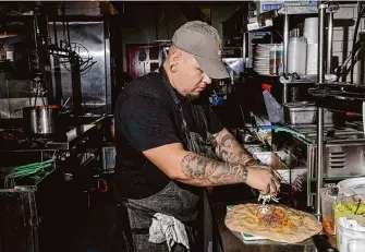  ?? Brontë Wittpenn/The Chronicle ?? In an Instagram post, La Vaca Birria owner Ricardo Lopez addressed a customer complaint about high prices and broke down the reasons his popular grilled cheese birria burrito now costs $22.
